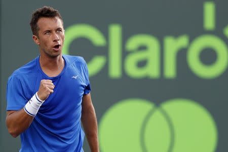 Mar 26, 2017; Miami, FL, USA; Philip Kohlschreiber of Germany reacts after winning the first set against Rafael Nadal of Spain (not pictured) on day six of the 2017 Miami Open at Crandon Park Tennis Center. Mandatory Credit: Geoff Burke-USA TODAY Sports