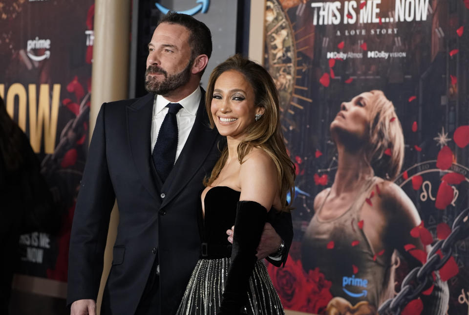 Ben Affleck, left, and Jennifer Lopez arrive at the premiere of "This Is Me... Now: A Love Story" on Tuesday, Feb. 13, 2024, at the Dolby Theatre in Los Angeles. (Photo by Jordan Strauss/Invision/AP)