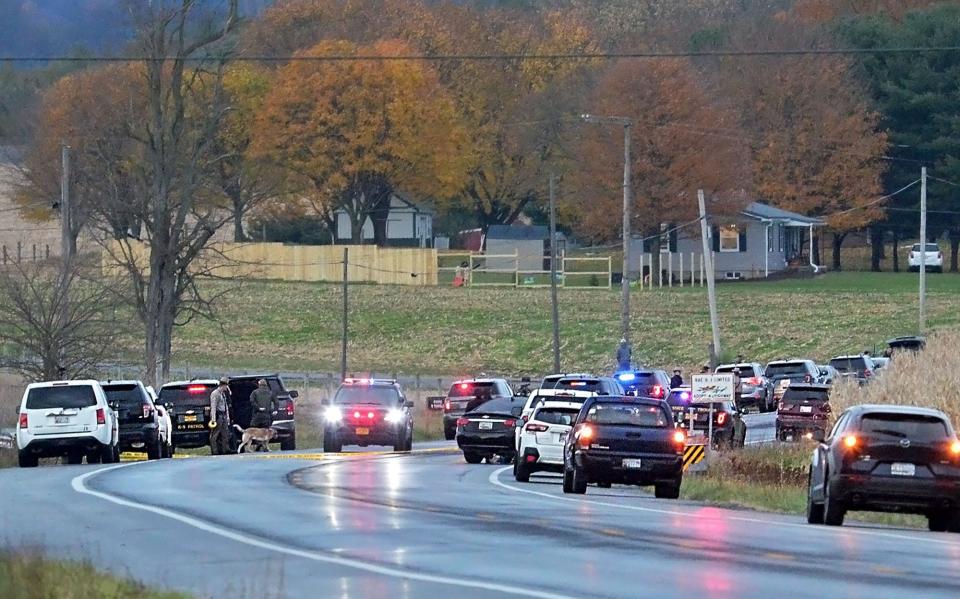 Police close Ringgold Pike between Misty Meadow Road and Rinehart Road late Thursday, November 18, 2021. Earlier that day, police say Robert Vicosa, 41, a former Baltimore County police officer, and Tia Bynum, a Baltimore County police officer suspended from the department, and Vicosa's two daughters, 7-year-old Giana Vicosa and 6-year-old Aaminah, died when Vicosa shot the females, then turned the gun on himself while fleeing police in Pennsylvania. The vehicle in which they were riding crashed near the intersection.