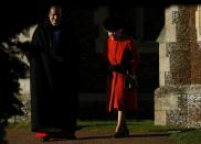 Britain's Queen Elizabeth leaves a Christmas Day morning service at the church on the Sandringham Estate in Norfolk, eastern England, December 25, 2013. REUTERS/Andrew Winning (BRITAIN - Tags: ROYALS RELIGION)