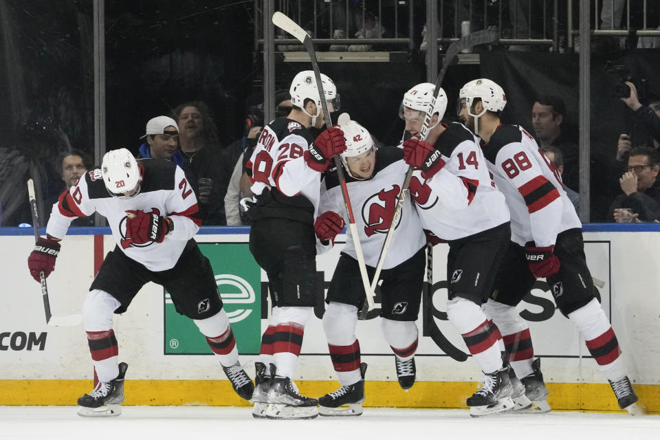 New Jersey Devils center Curtis Lazar (42) celebrates scoring a goal against the New York Rangers during the first period of an NHL hockey game, Saturday, April 29, 2023, at Madison Square Garden in New York. (AP Photo/Mary Altaffer)