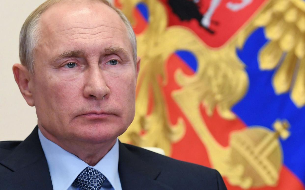 In a new article, Russian President Vladimir Putin said Poland threw its own people 'under Hitler's machine of destruction' - Kremlin Pool/Shutterstock