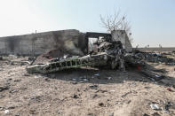 08 January 2020, Iran, Shahedshahr: Debris of an aircraft lay at the scene, where a Ukrainian airplane carrying 176 people crashed on Wednesday shortly after takeoff from Tehran airport, killing all onboard. Photo: Mahmoud Hosseini/dpa (Photo by Mahmoud Hosseini/picture alliance via Getty Images)