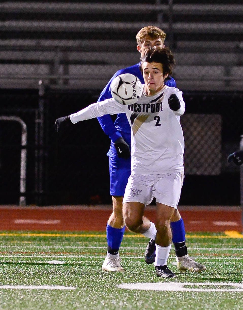 Westport's Hunter Brodeur makes a play on the ball in the Division V semifinal game against Douglas at Walpole High School.