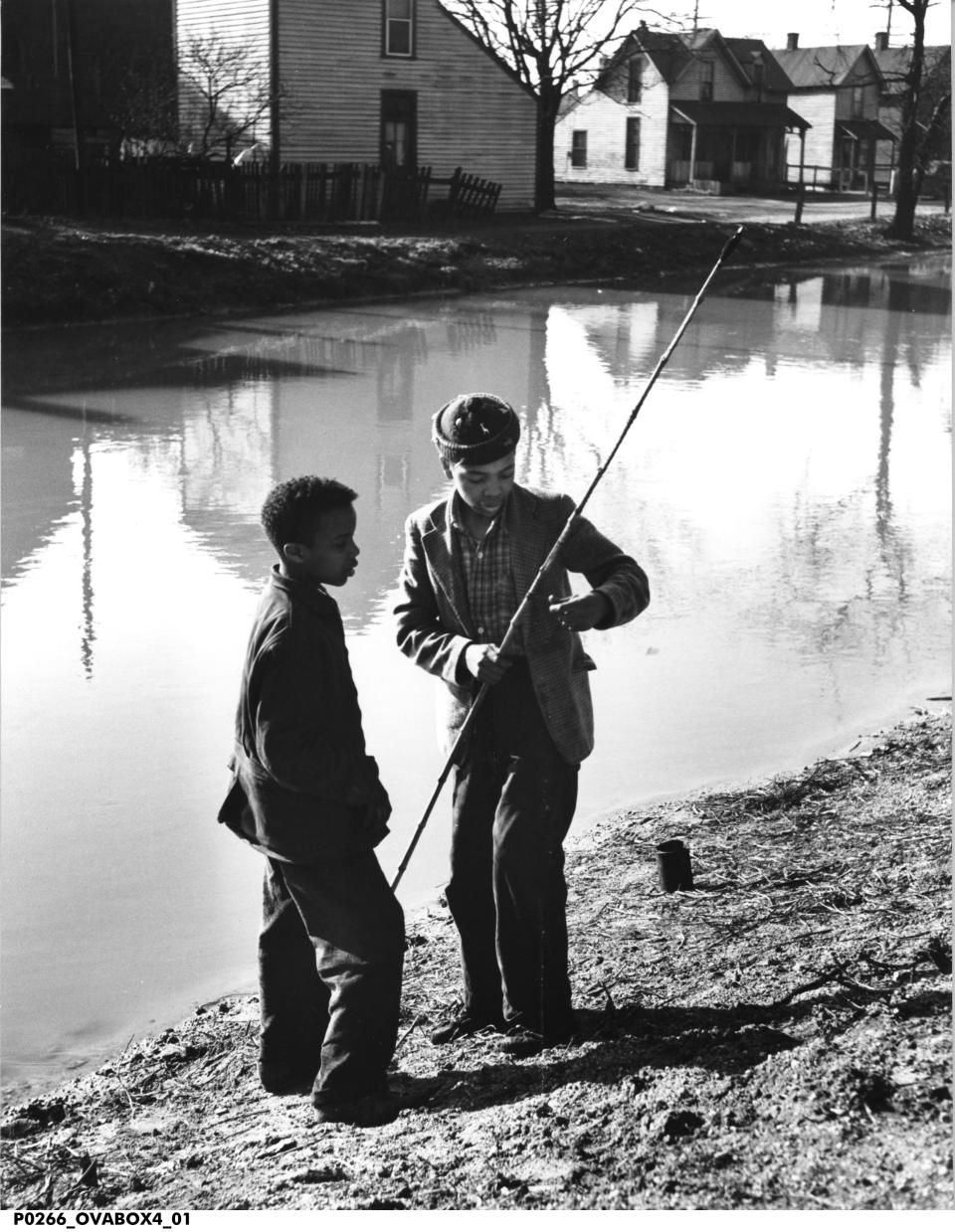 Photojournalist Oscar James Fox captured images of Indy's near west side, along the Canal and around Indiana Avenue, from 1945-1960. Here is a photograph titled "Two Boys Fishing on the Canal." Fox's photos preserve a period and place later erased by urban renewal and redevelopment plans.