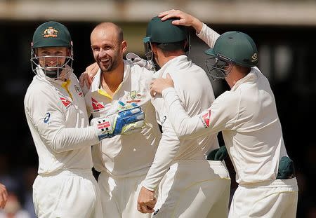 Cricket - England v Australia - Investec Ashes Test Series Second Test - Lord’s - 19/7/15 Australia's Nathan Lyon celebrates the wicket of England's Ian Bell with team mates Action Images via Reuters / Andrew Couldridge Livepic