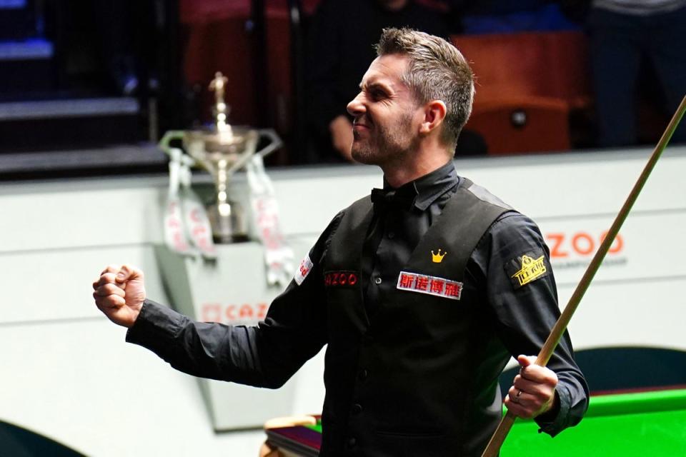 Mark Selby celebrates after completing a maximum break (PA)