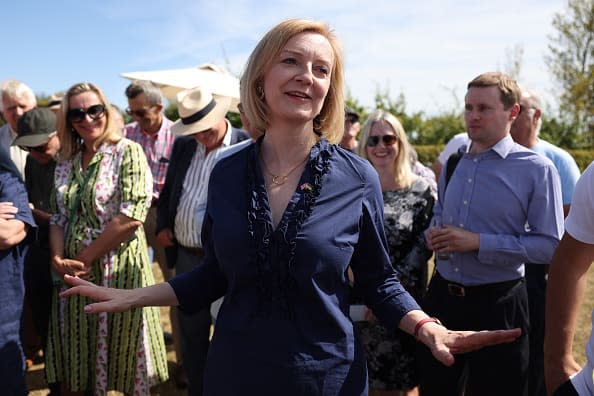 <div class="inline-image__caption"><p>Liz Truss gestures as she speaks to people while campaigning for the Conservative Party Leadership on July 23, 2022 in Marden, England.</p></div> <div class="inline-image__credit">Hollie Adams/Getty Images</div>