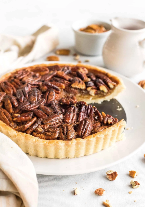 <p>Dish by Dish</p><p>This easy pecan pie recipe has a pecan filling held together by a light and flaky crust. No corn syrup used, gluten-free and dairy-free too.</p><p><strong>Get the recipe: <a href="https://www.dishbydish.net/easy-pecan-pie-recipe/" rel="nofollow noopener" target="_blank" data-ylk="slk:Easy Pecan Pie (Gluten-Free, Dairy-Free);elm:context_link;itc:0;sec:content-canvas" class="link ">Easy Pecan Pie (Gluten-Free, Dairy-Free)</a></strong></p>