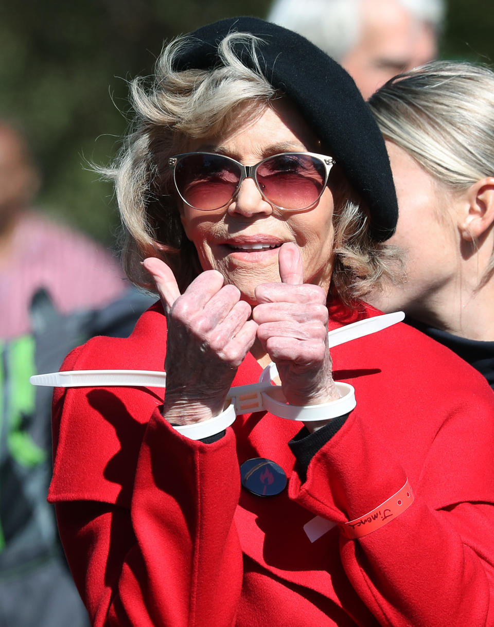 WASHINGTON, DC - OCTOBER 18: Actress Jane Fonda is arrested for blocking a street in front of the U.S. Capitol during a “Fire Drill Fridays” climate change protest and rally on Capitol Hill, October 18, 2019 in Washington, DC. Protesters are demanding urgent action on adapting the Green New Deal, clean, renewable energy, and an end to all new fossil fuel exploration and drilling.   (Photo by Mark Wilson/Getty Images)