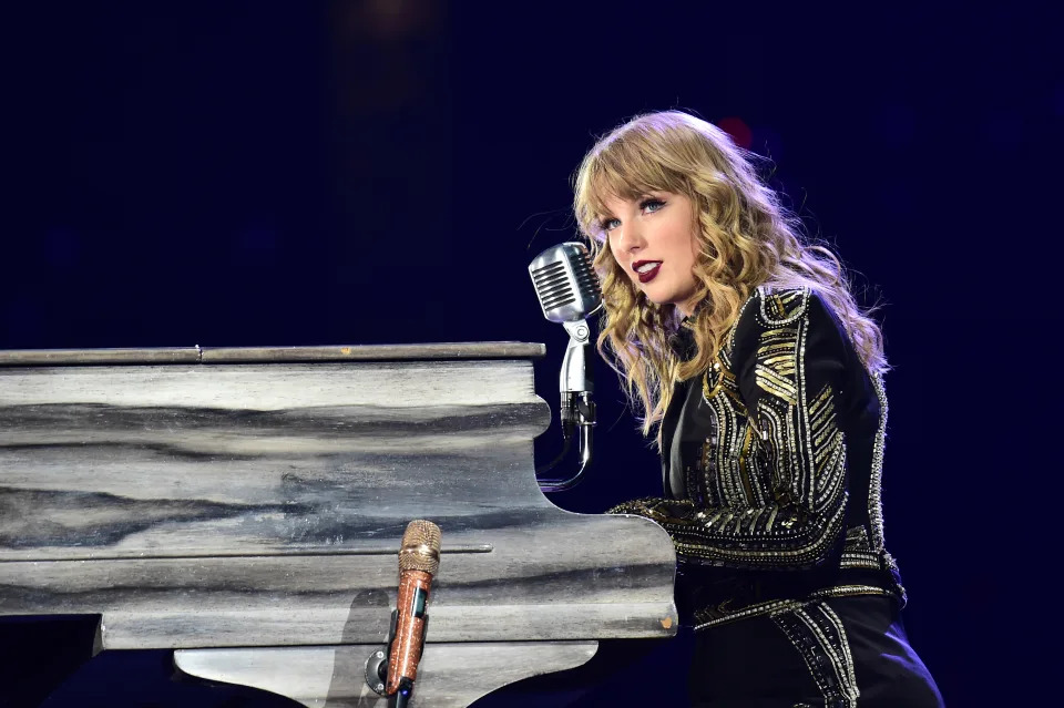 she's playing piano on stage