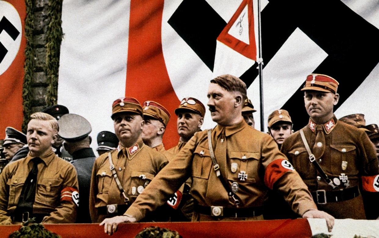 Rabble-rouser: Hitler and other Nazi leaders at a rally in Germany, circa 1934 - Universal History Archive