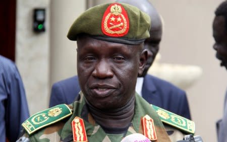 FILE PHOTO: South Sudanese newly appointed army chief General James Ajongo speaks to the media after his swearing in at the Presidential Palace in South Sudan's capital of Juba, May 10, 2017. REUTERS/Stringer