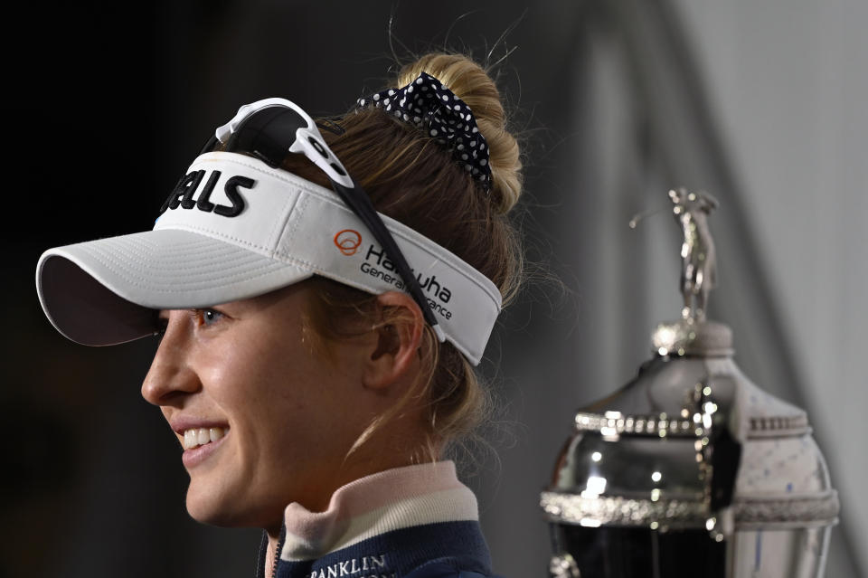 Nelly Korda talks to the media following her one-stroke win at the LPGA Pelican Women's Championship golf tournament at Pelican Golf Club, Sunday, Nov. 14, 2021, in Belleair, Fla. (AP Photo/Steve Nesius)