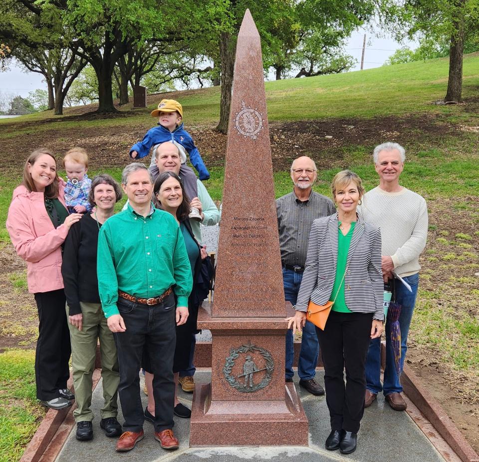 Descendants of Louis Antoine Andry gather around the Patriot Monument at the Texas State Cemetery that will honor, among others, the engineer and mapmaker who died near Indianola. Some of the relatives only recently discovered one another.
