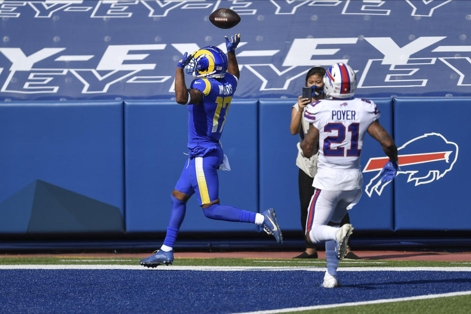 Los Angeles Rams wide receiver Robert Woods celebrates as he scores a touchdown in front of Buffalo Bills free safety Jordan Poyer (21) during the second half of an NFL football game Sunday, Aug. 26, 2018, in Orchard Park, N.Y. (AP Photo/Adrian Kraus)