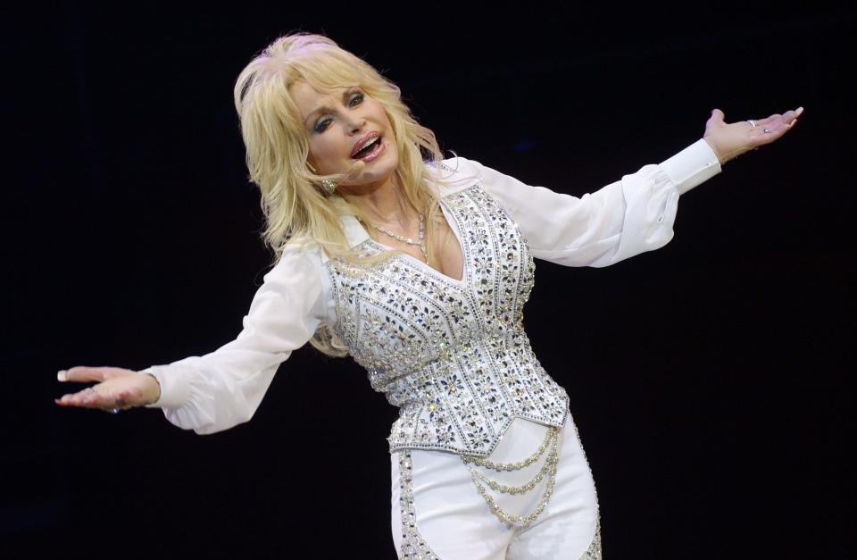Dolly Parton performs at a concert to benefit Dolly Parton's Imagination Library