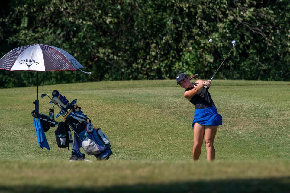 Castle’s Samantha Lawrence hits from the 6th fairway during the IHSAA girls golf sectional at Fendrich Golf Course in Evansville, Ind., Saturday morning, Sept. 17, 2022. 