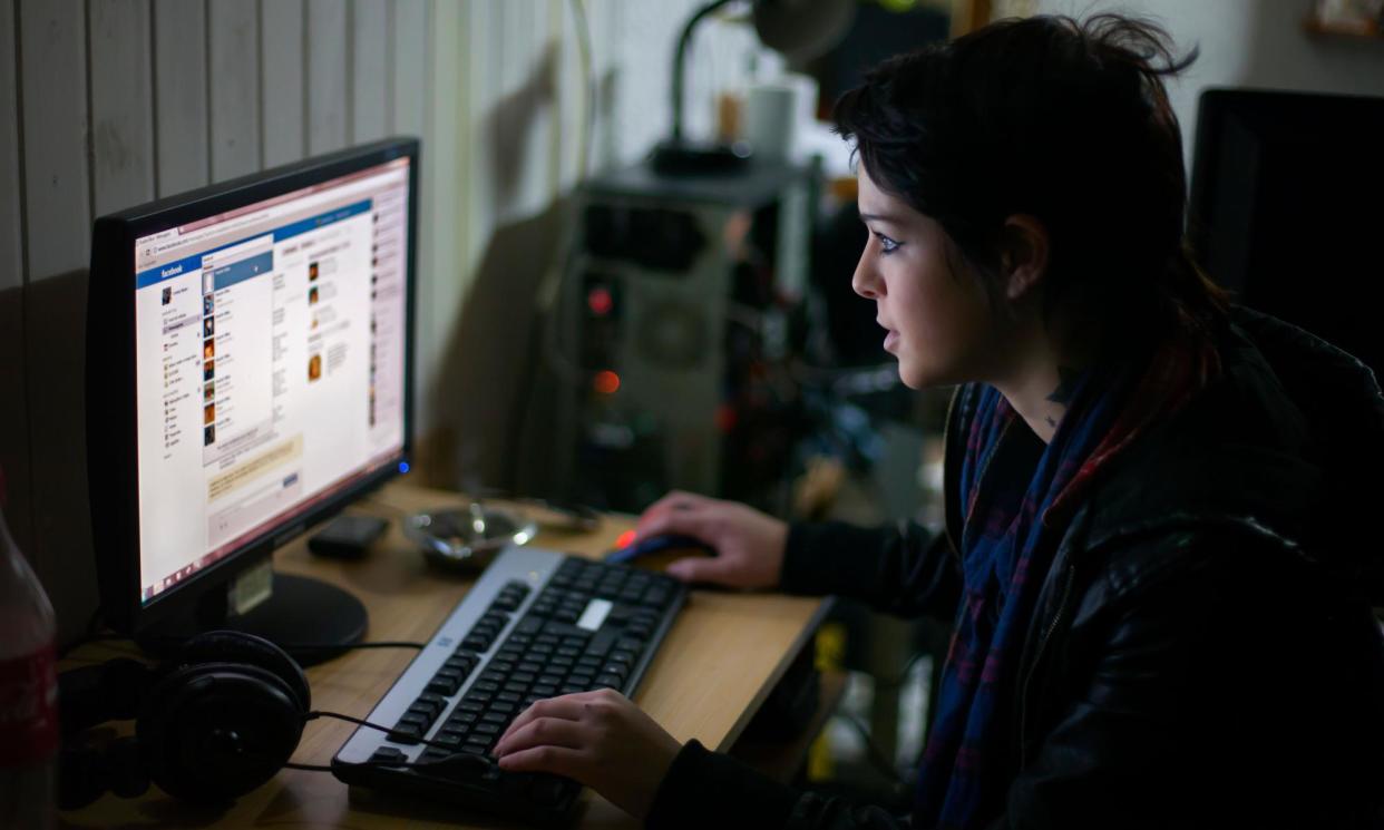 <span>Girls were more likely to spend too much time on the internet than boys.</span><span>Photograph: Rachel Torres/Alamy</span>