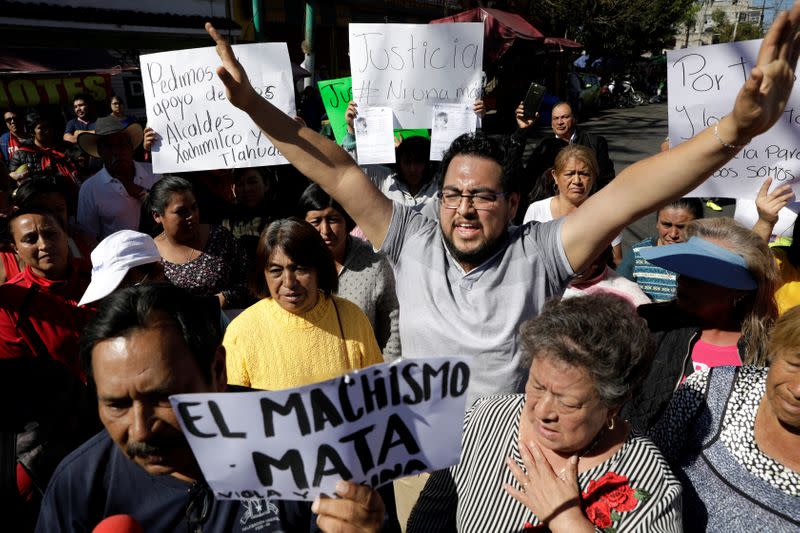 People protest outside the school of seven-year old Fatima Cecilia Aldrighett, who went missing on February 11 and whose body was discovered last weekend inside a plastic garbage bag, in Mexico City