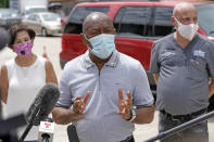 File-Houston Mayor Sylvester Turner speaks at free COVID-19 testing provided by United Memorial Medical Center at the Mexican Consulate Sunday, June 28, 2020, in Houston. Top officials in Houston are calling for the city to lock back down as area hospitals strain to accommodate the onslaught of patients sick with the new coronavirus. Mayor Turner and Harris County Judge Lina Hidalgo, both Democrats, said this weekend that a stay-at-home order is needed for America's fourth-largest city to cope with the surge of COVID-19 cases. (AP Photo/David J. Phillip, File)