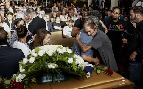 Antonio Basco greets well wishers to a public memorial for his wife, Margie Reckard - Credit: Sandy Huffaker/Getty Images