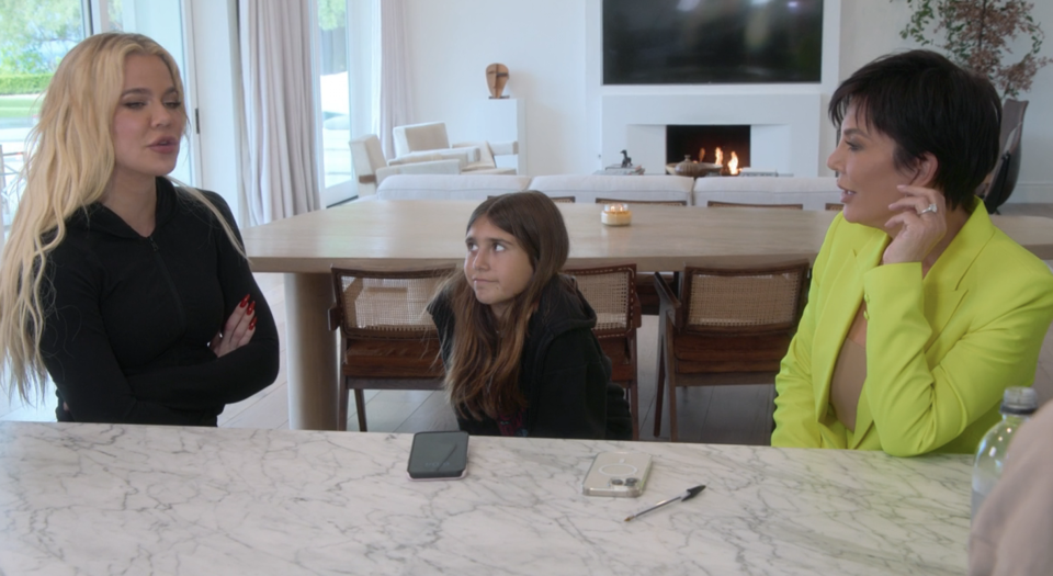 Khloé, Penelope, and Kris at a table