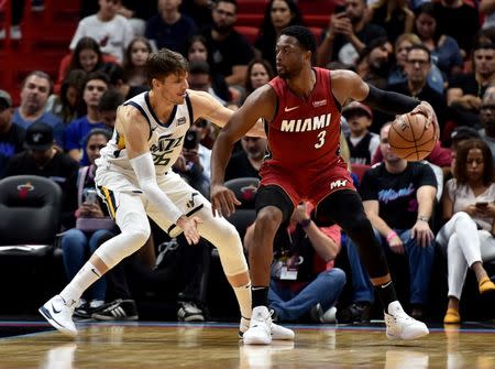Dec 2, 2018; Miami, FL, USA; Miami Heat guard Dwyane Wade (3) is pressured by Utah Jazz guard Kyle Korver (26) during the second half at American Airlines Arena. Mandatory Credit: Steve Mitchell-USA TODAY Sports