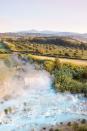 <p>These aquamarine hot springs are a sight to see. And you'll also get to enjoy sweeping views of the Tuscan countryside while soaking. </p><p><a class="link " href="https://go.redirectingat.com?id=74968X1596630&url=https%3A%2F%2Fwww.tripadvisor.com%2FTourism-g1184643-Saturnia_Manciano_Province_of_Grosseto_Tuscany-Vacations.html&sref=https%3A%2F%2Fwww.prevention.com%2Flife%2Fg42690139%2Fmost-beautiful-places-world%2F" rel="nofollow noopener" target="_blank" data-ylk="slk:Shop Now;elm:context_link;itc:0">Shop Now</a> </p>