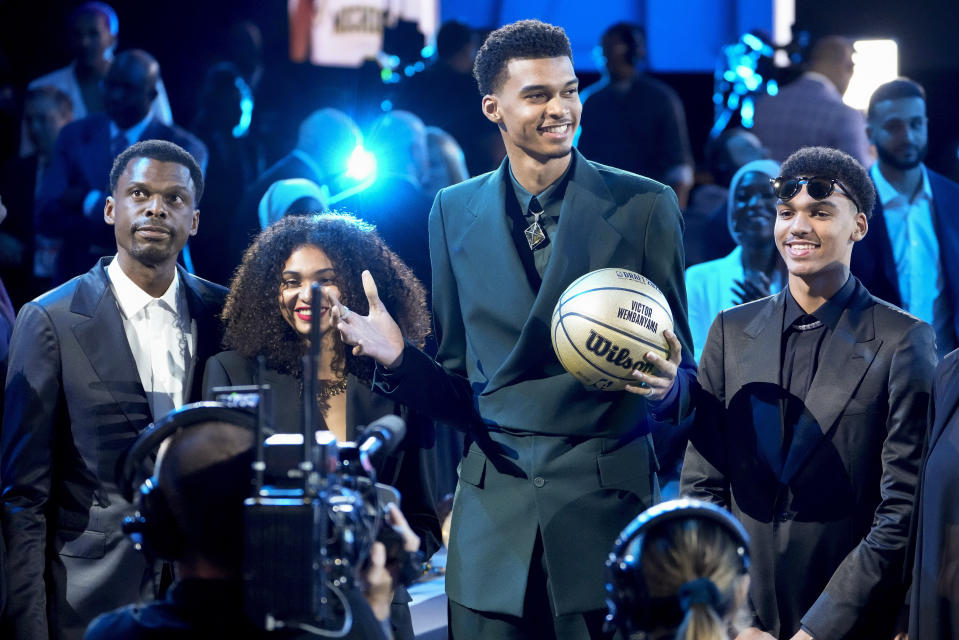 Victor Wembanyama reacts during introductions before the NBA basketball draft, Thursday, June 22, 2023, in New York. (AP Photo/John Minchillo)