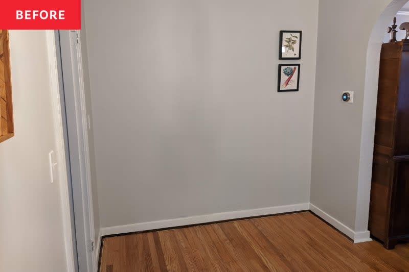 Before: a gray wall with two small pieces of art hanging