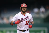 Washington Nationals' Kyle Schwarber rounds the bases after hitting a home run in first inning of the first baseball game of a doubleheader against the San Francisco Giants, Saturday, June 12, 2021, in Washington. This game is a makeup of a postponed game from Thursday. (AP Photo/Nick Wass)