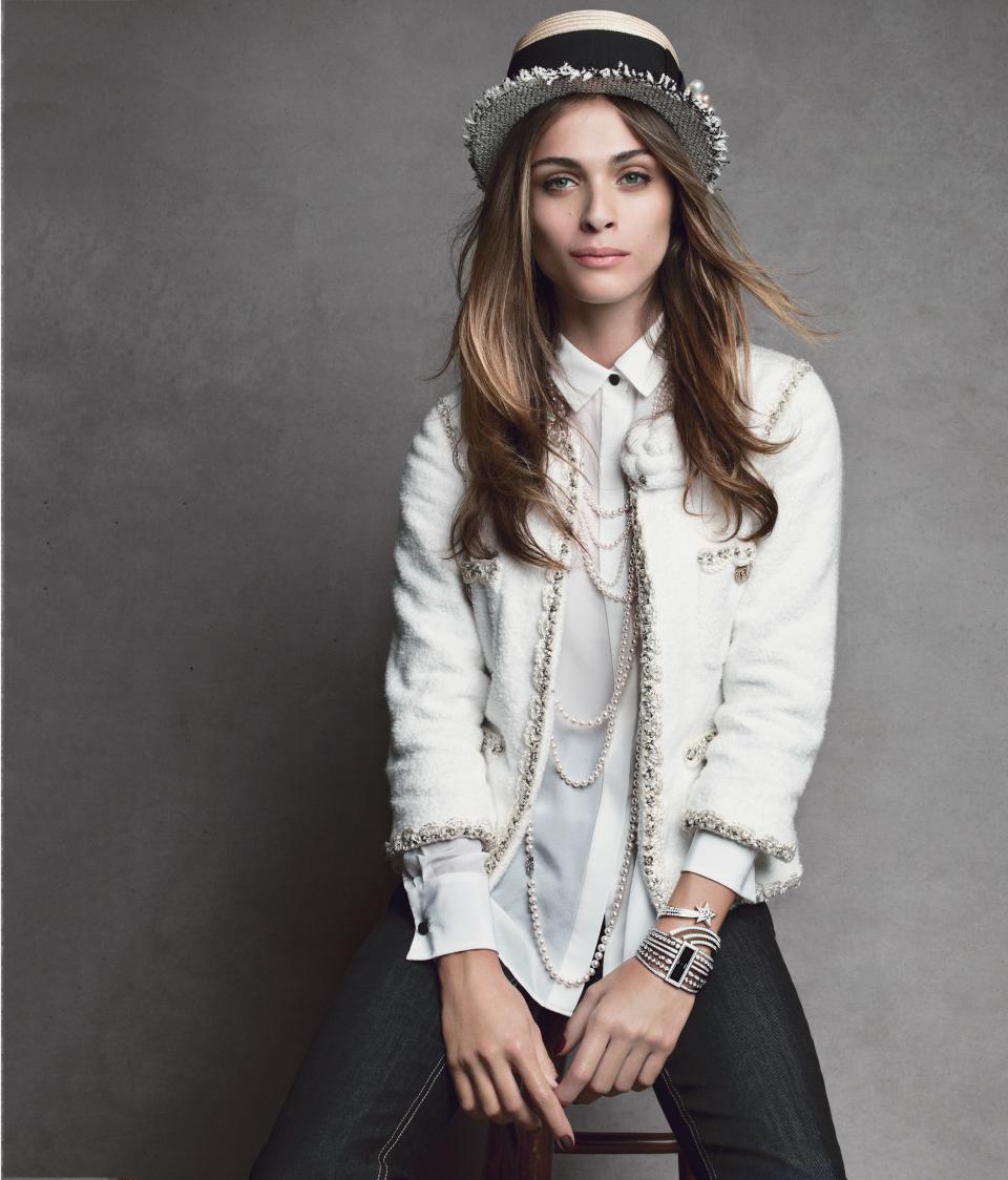 Elisa Sednaoui in a Chanel boater and jacket accessorized with Chanel Fine Jewelry pearl sautoir with diamonds, diamond-and-white-gold bracelet, and watch; Mikimoto Akoya cultured-pearl necklaces.