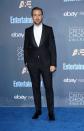 <p>Ryan donned a smart Gucci tuxedo and simple white shirt. <i>[Photo: Getty]</i> </p>