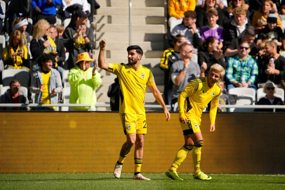 Oct 8, 2022; Columbus, Ohio, USA; Columbus Crew 2 Marco Micaletto (22) celebrates a goal with Columbus Crew 2 Tristan Weber (12) during the first half of the MLS NEXT Pro Cup Championship against the St. Louis CITY2 at Lower.com Field. Mandatory Credit: Adam Cairns-The Columbus Dispatch