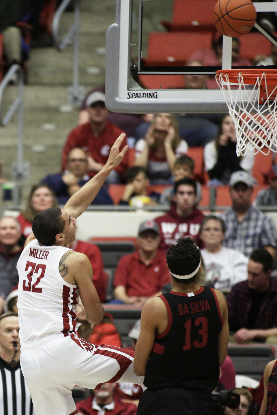 Washington State forward Tony Miller (32) shoots near Stanford forward Oscar da Silva (13) during the second half of an NCAA college basketball game in Pullman, Wash., Sunday, Feb. 23, 2020. Stanford won 75-57. (AP Photo/Young Kwak)