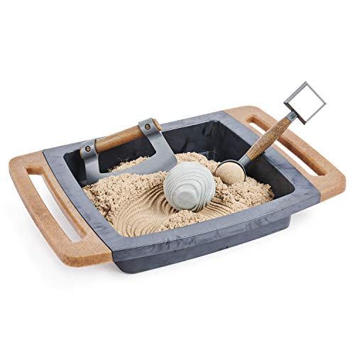 <p><strong>Kinetic Sand Store</strong></p><p>amazon.com</p><p><strong>$29.99</strong></p><p><a href="https://www.amazon.com/dp/B084BT3266?tag=syn-yahoo-20&ascsubtag=%5Bartid%7C10055.g.34935171%5Bsrc%7Cyahoo-us" rel="nofollow noopener" target="_blank" data-ylk="slk:Shop Now;elm:context_link;itc:0;sec:content-canvas" class="link ">Shop Now</a></p><p>Children have long known how soothing it can be to run sand through your fingers, either on the beach or on a play table. But this sandbox was designed for adults. Keep it on your desk, and <strong>when work stress gets too overwhelming, you can just roll a rock through the sand </strong>or let it slide through your fingers.</p>