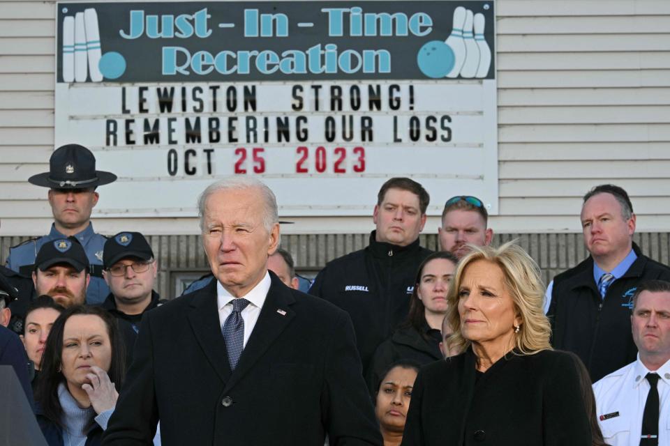 US President Joe Biden waits to speakwith First Lady Jill Biden surrounded by first responders, nurses, and others on the front lines of the response to the October 25, 2023 mass shooting in Lewinston, Maine, on November 3, 2023.