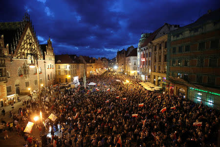 People attend a protest against judicial reforms in Warsaw, Poland, July 26, 2017. Agencja Gazeta/Mieczyslaw Michalak via REUTERS