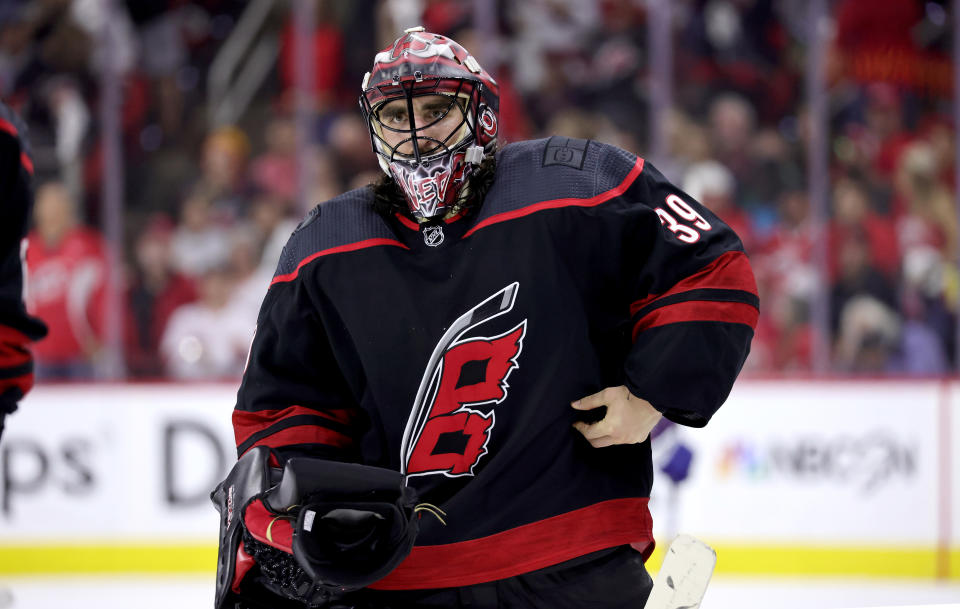 RALEIGH, NC - JUNE 8: Alex Nedeljkovic #39 of the Carolina Hurricanes returns to the crease to protect the net after a time out in Game Five of the Second Round of the 2021 Stanley Cup Playoffs against the Tampa Bay Lighting on June 8, 2021 at PNC Arena in Raleigh, North Carolina. (Photo by Gregg Forwerck/NHLI via Getty Images)