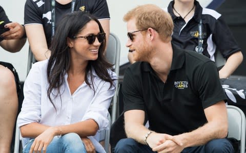 Prince Harry and Meghan watch the wheelchair tennis in Toronto - Credit: Samir Hussein