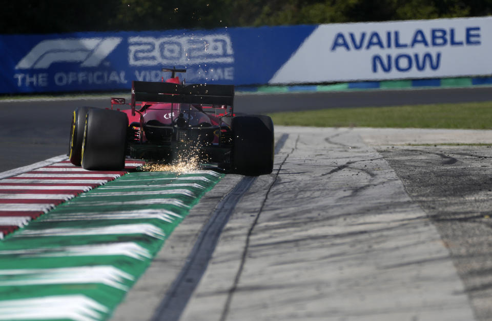 Ferrari driver Charles Leclerc of Monaco steers his car during the second free practice at the Hungaroring racetrack in Mogyorod, Hungary, Friday, July 30, 2021. The Hungarian Formula One Grand Prix will be held on Sunday. (AP Photo/Darko Bandic)