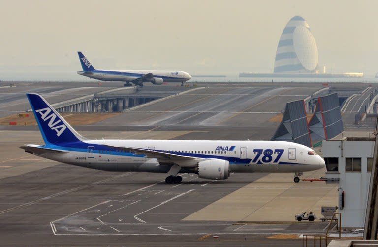 An All Nippon Airways' (ANA) Boeing 787 dreamliner is pulled by a towing tractor at Tokyo's Haneda airport on January 16, 2013. Japan plans to impose additional safety requirements on Japanese airlines when it allows them to resume flying the Boeing 787 Dreamliner, a newspaper reported on Friday