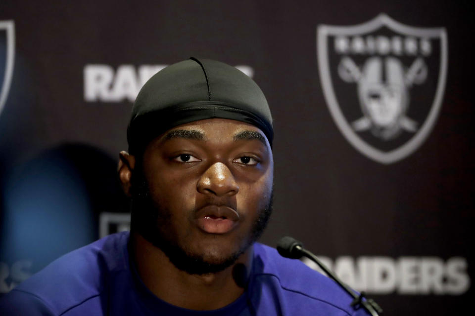 FILE - In this Oct. 12, 2018, file photo, Oakland Raiders wide receiver Amari Cooper speaks during a press conference at the Hilton London Wembley hotel in London. The Dallas Cowboys have acquired Oakland receiver Amari Cooper for a first-round draft pick. Raiders general manager Reggie McKenzie said Monday, Oct. 22, 2018, his team will get the pick in the 2019 draft. (AP Photo/Matt Dunham, File)