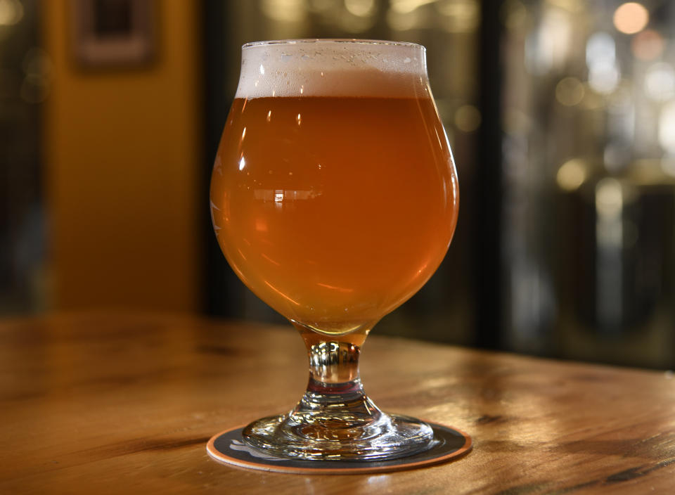 <strong>Flavor:</strong>&nbsp;A strong hoppy flavor, with a slightly (or extremely) bitter taste.<br /><br /><strong>Color:</strong>&nbsp;Usually amber and cloudy, but IPAs come in a range of darker and lighter colors now.<br /><br /><strong>Strength: </strong>Typically <a href="https://www.beeradvocate.com/beer/style/150/" target="_blank">4.5-6 percent ABV</a>, but some brewers have tried to recreate the original IPAs with an ABV closer to 8 or 9 percent.<br /><br /><strong>Fun Fact:</strong> During the 1700s, when English troops lived in India, the typical pale ale brew most Englishmen drank would spoil before the ship reached the Indian shores. In order to prolong the beer's shelf life, <a href="https://www.theguardian.com/lifeandstyle/2015/jan/30/brief-history-of-ipa-india-pale-ale-empire-drinks" target="_blank">brewers added more hops</a>, which is a natural preservative. And that's how the hoppiest beer style was born.