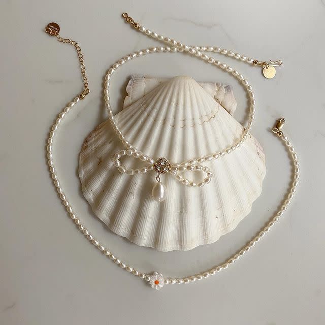 <p>Pearls are the diamonds du jour, and Margaux Studios has them in abundance. Loved by the likes of actor <a href="https://www.elle.com/uk/life-and-culture/culture/a36024686/nicola-coughlan-sag-awards/" rel="nofollow noopener" target="_blank" data-ylk="slk:Nicola Coughlan;elm:context_link;itc:0;sec:content-canvas" class="link ">Nicola Coughlan</a>, these made-to-order pieces pack a dainty punch. </p><p><a class="link " href="https://www.margauxstudios.com/" rel="nofollow noopener" target="_blank" data-ylk="slk:SHOP MARGAUX STUDIOS NOW;elm:context_link;itc:0;sec:content-canvas">SHOP MARGAUX STUDIOS NOW</a></p><p><a href="https://www.instagram.com/p/CSWyI1Ctgad/" rel="nofollow noopener" target="_blank" data-ylk="slk:See the original post on Instagram;elm:context_link;itc:0;sec:content-canvas" class="link ">See the original post on Instagram</a></p>