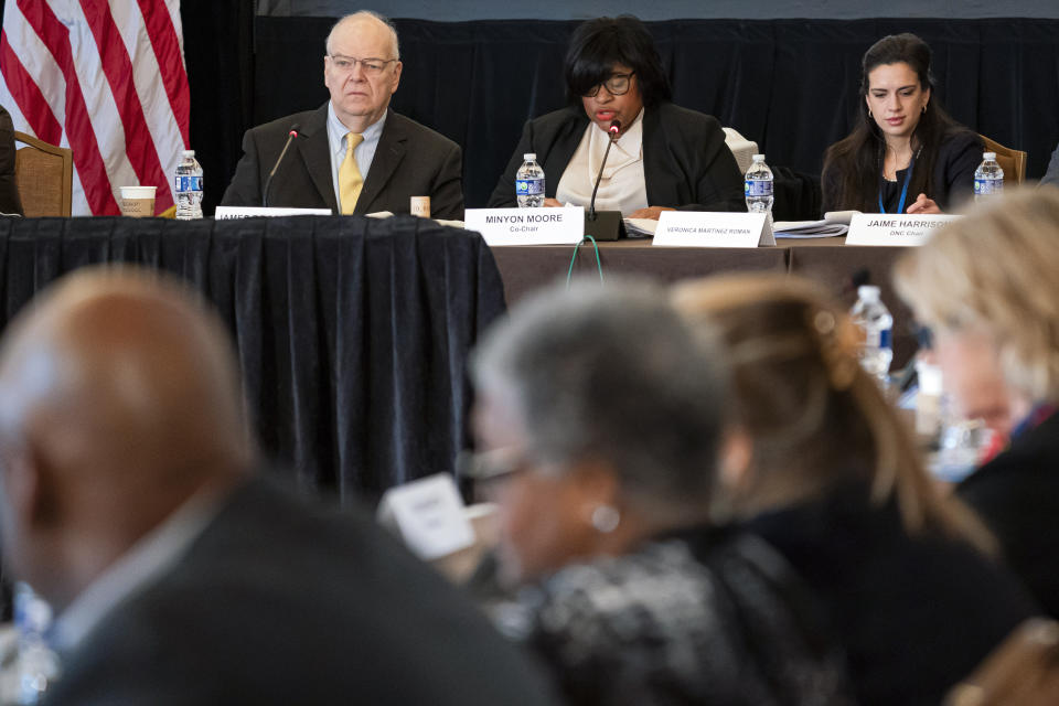 The Democratic National Committee Rules and Bylaws Committee discuss proposed changes to the primary system meeting at the Omni Shoreham Hotel on Friday, Dec. 2, 2022, in Washington. (AP Photo/Nathan Howard)