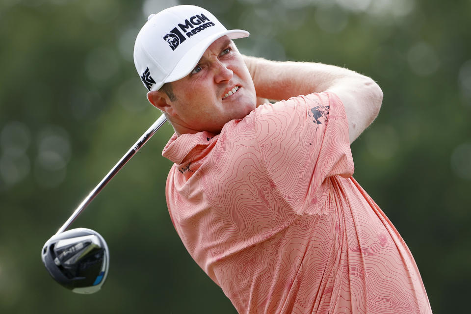 Jason Kokrak hits his tee shot on the 18th hole during the final round of the Charles Schwab Challenge. (Photo by Tom Pennington/Getty Images)