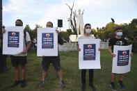 Protesters take part in a rally against the visit of the U.S. Secretary of State Mike Pompeo in Greece, in the northern city of Thessaloniki, on Monday, Sept. 28, 2020. Pompeo said Monday that Washington will use its diplomatic and military influence in the region to try to ease a volatile dispute between NATO allies Greece and Turkey over energy rights in the eastern Mediterranean. (AP Photo/Giannis Papanikos)