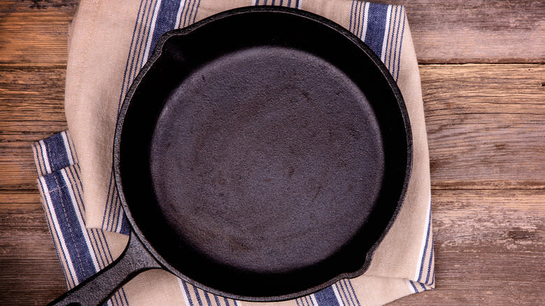 Cast iron skillet on wooden table